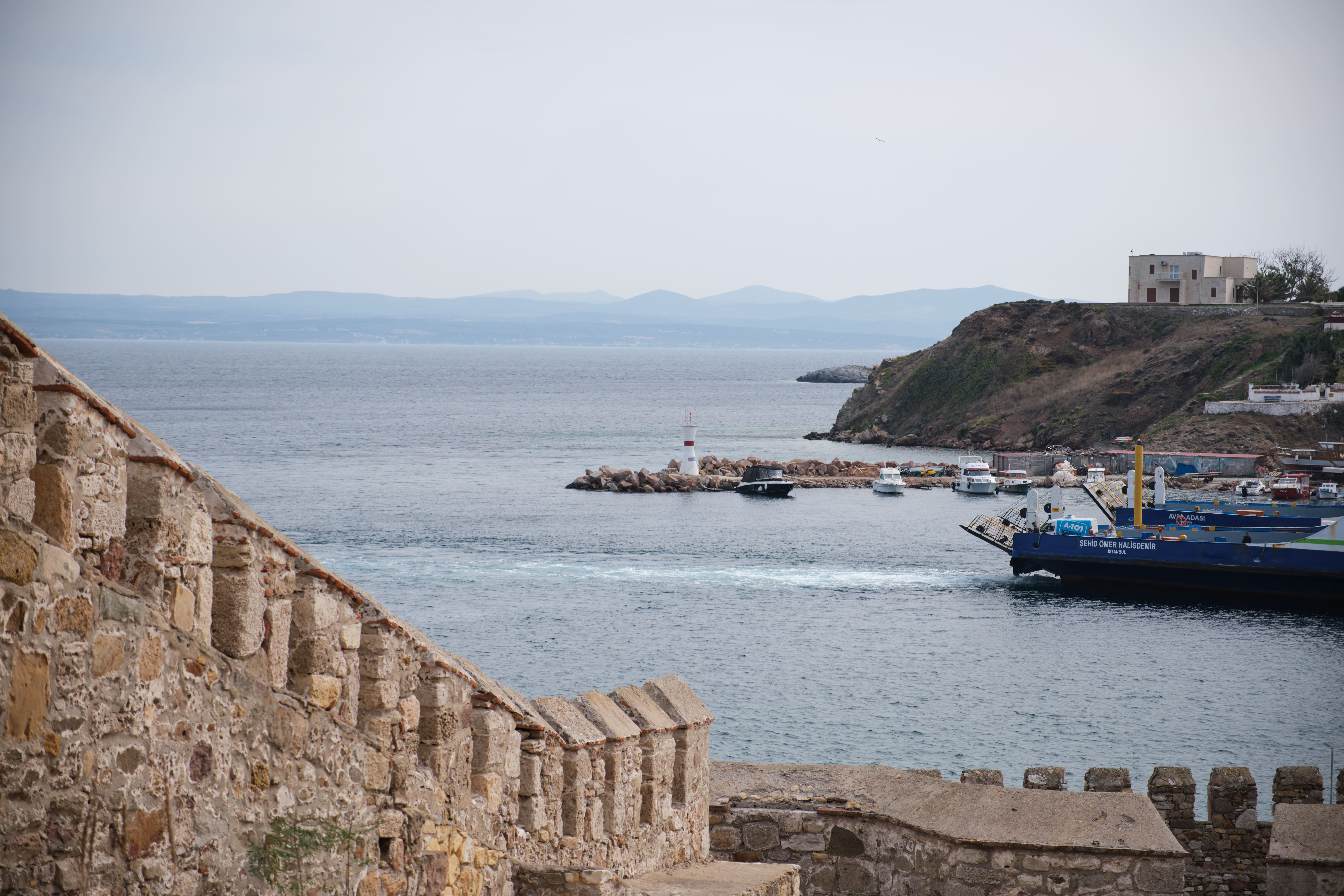 Bozcaada harbour, its breakwater and the ferry quay